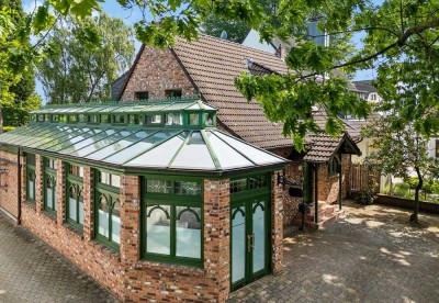 Einzigartiges Architektenhaus mit Wintergarten-Oase — Wohnen und Arbeiten unter einem Dach in Kaarst