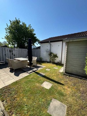 Schöne 3-Zimmer-Gartenwohnung auf zwei Ebenen mit Garage, EBK und Gartenanteil in Hallbergmoos