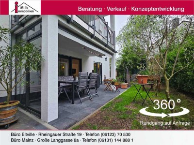 Schicke Maisonettewohnung mit Terrasse und schönem Garten