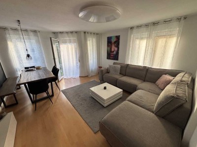 Lichtdurchflutete 2-Zi. EG-Whg. mit zwei Terrassen und TG