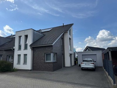 Hochwertige Zweifamilien-Doppelhaushälfte mit Garten verkehrsberuhigt