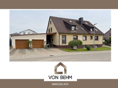 von Behm Immobilien -  Gepflegtes Zweifamilienhaus mit außergewöhnlichem Gartenidyll