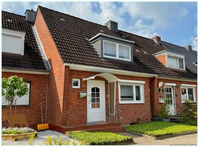 Husum zentrumsnah: Kompaktes gepflegtes RMH  mit Keller u Südgarten in beliebter ruhiger Wohnlage !