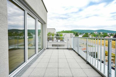 Urbanes Wohngefühl mit Weitblick: Lichtdurchflutete 2-Zi.-Wohnung mit großzügiger Dachterrasse