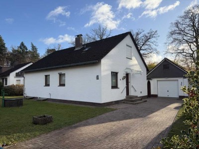 Attraktives Einfamilienhaus mit Keller, Süd- West Terrasse und Garage in ruhiger Ortslage