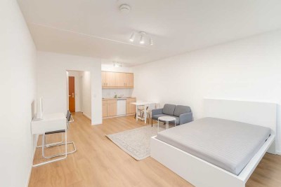 Helles, stylisch möbliertes 1-Zimmer Appartment mit Panorama Blick direkt am Olympia Einkaufszentrum