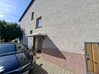 Zweifamiliendoppelhaushälfte im Herzen von Langen