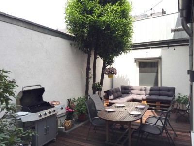 Geschmackvolle, modernisierte 4-Zimmer-Terrassenwohnung mit geh. Innenausstattung mit Balkon
