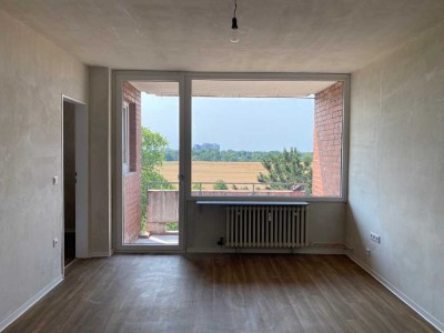 Singles aufgepasst: teilsanierte 1-Zimmer-Wohnung mit Abstellkammer und Balkon!