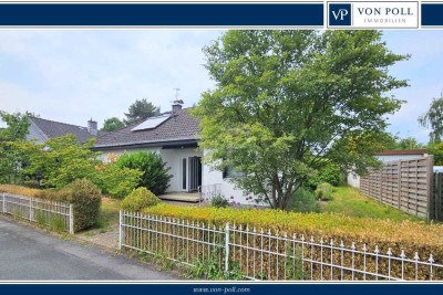 Ihr neues Zuhause in Feldrandlage und doch zentral: Bungalow mit Garten, Garage und großem Potenzial