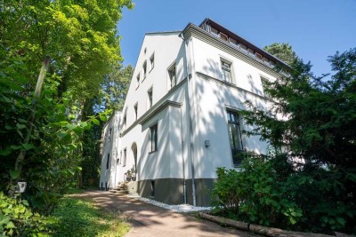 Helle Souterrain-Wohnung mit Gartennutzung und EBK