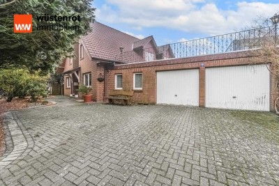 Geräumiges Wohnhaus mit Doppelgarage und vielfältigen Nutzungsmöglichkeiten in begehrter Wohnlage