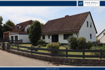 Einfamilienhaus mit Einliegerwohnung und Garten in idyllischer Lage