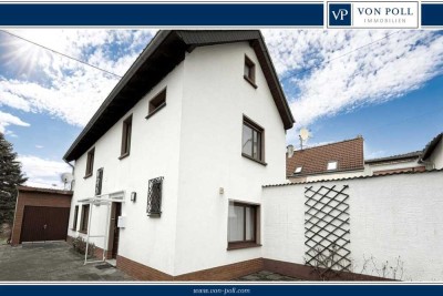 Familienfreundlich – Solides Einfamilienhaus mit großzügigem Grundstück