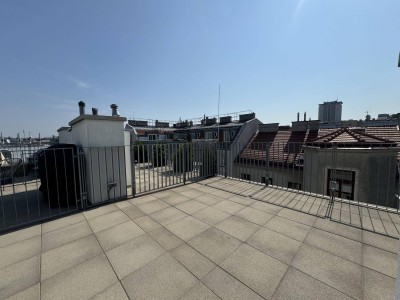 Erstbezugs-DG-Wohnung mit Terrasse und Weitblick!