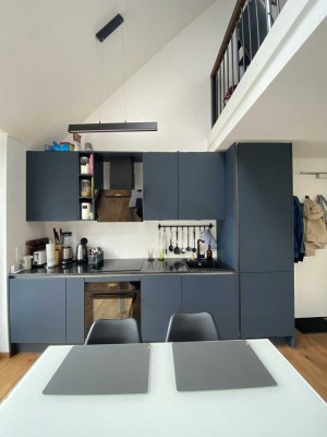 Luxuriöse doppelstäckige Penthouse-Wohnung mit Balkon & Tiefgarage in ruhiger Lage