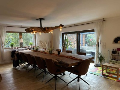 Hochwertige Erdgeschosswohnung mit Terrasse, Garten und Kamin
