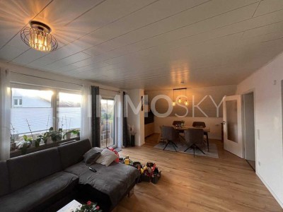 Exklusive Dachwohnung mit Garten und Blockhaus in Toplage