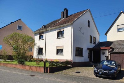 Vielseitiges Einfamilienhaus mit Schuppen, Garage, Garten und Potenzial in 56414 Meudt