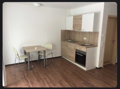 All inclusive - 1-Zimmer-EG-Wohnung mit Balkon und Einbauküche