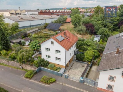 Mehrfamilienhaus mit Gartenidylle