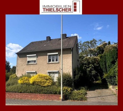 Sanierungsobjekt in zentraler Lage von Übach! Ein-/Zweifamilienhaus mit großem Garten