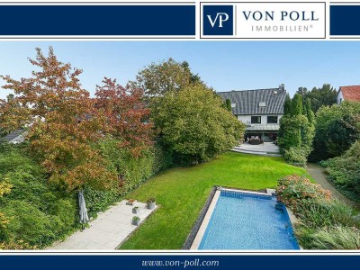Exklusives Haus mit traumhaftem Grundstück / Großzügiges Familienrefugium mit Pool, Kamin und Garten