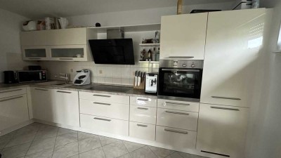 3,5 Zimmer-Wohnung mit Balkon, Gartenanteil & TG-Stellplatz in Metzingen