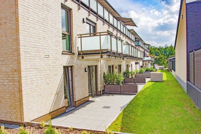 Erdgeschosswohnung mit Einbauküche und großer Terrasse inkl. Service