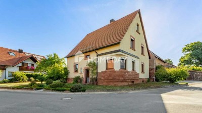 Charmantes Einfamilienhaus mit großem Garten und Ausbaupotenzial