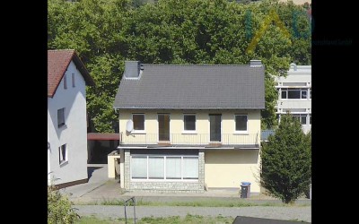 Einfamilienhaus mit 9 Zimmern, 2 Zi Einliegerwohnung und Garten