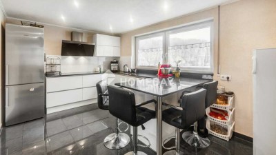 Großzügige 4,5-Zimmer-Wohnung mit moderner Ausstattung, geräumiger Terrasse und Garage