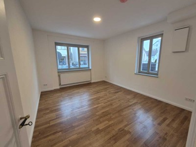 Gemütliche 3-Zimmer Wohnung mit direktem Zugang zum Main. Erstbezug nach Kernsanierung inklusive EBK