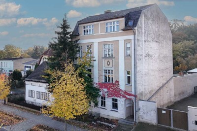 Wohn- und Geschäftshaus mit umfassendem Modernisierungsbedarf und Potenzial