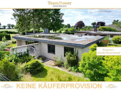 Ebenerdig wohnen mit Komfort: Gepflegter Bungalow auf großzügigem Grundstück