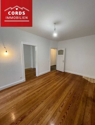 Nun verfügbar!Erdgeschosswohnung mit 2 Balkonen und Gartenmitbenutzung