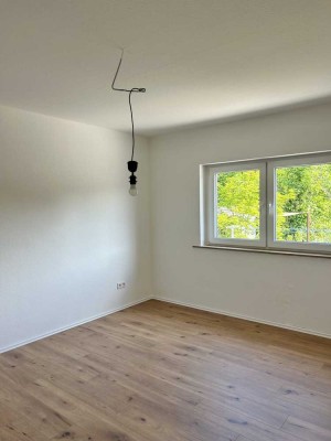 Moderne Erdgeschosswohnung mit eigenem Garten – Top renoviert!