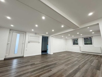 Frisch sanierte 2-Zimmer-Souterrain-Wohnung mit Terrasse