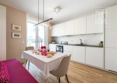 Wohnen im modernen Stadthaus: Penthaus-Maisonette mit 5 Zimmern & 14 m² Loggia - jetzt einziehen!