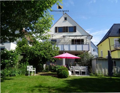 Sehr attraktives 2-Familienhaus mit Maisonette-Wohnung und Gartenoase in ruhiger Toplage.