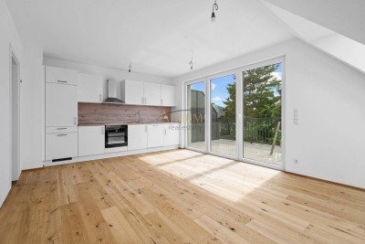 Erstbezug – moderne 2-Zimmer-Dachgeschosswohnung mit Terrasse und Weitblick