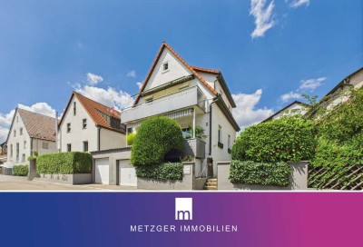 Viel Platz für Ihre Ideen – Charmantes 1-2 Familienhaus mit 2 Einzelgaragen und schönem Garten