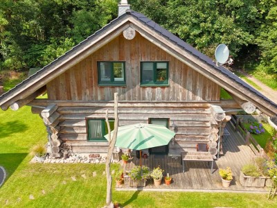 Exklusives Naturstammhaus in Bestlage – ökologisch & energieeffizient