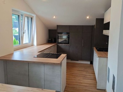 Neu renovierte Wohnung, mit Gartenanteil und optionaler Garage | Erstbezug