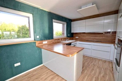 Wohnhaus mit bis zu 3 Einheiten, 2 EBK, Terrasse, Balkon, Garten und Garage