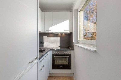 Single-Wohnung: Hochwertig saniert mit Einbauküche und Balkon