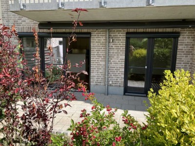 Gepflegte 3-Zimmer-Wohnung mit Süd-Terrasse, gehobener Ausstattung, EBK, großem Gemeinschaftsgarten