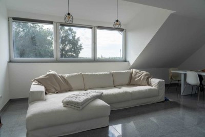 Attraktive und neuwertige 2-Zimmer-DG-Wohnung mit gehobener Innenausstattung in Loccum