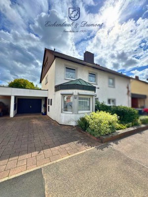 Einfamilienhaus mit Wintergarten, Garage + parkähnlichem Garten