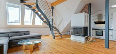 Großzügige Dachgeschosswohnung mit Terrasse in Top-Lage